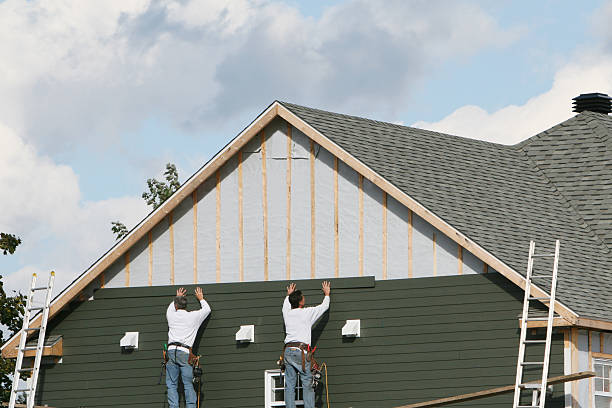 Professional Siding Contractor technician working in Sebastian, TX